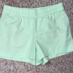 J. Crew size 4 Pull on, elastic waist band shorts, lime green color.